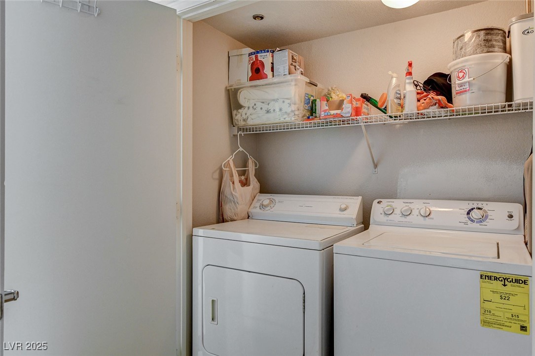 555 East Silverado Ranch Boulevard, Unit 1172 Las Vegas, NV 89183 - Photo 26 of 29 Washroom with washing machine and clothes dryer