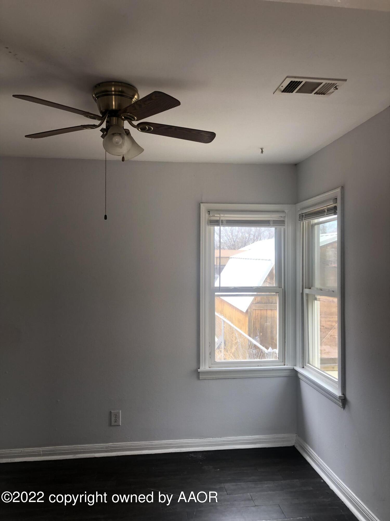 4110 South Polk Street Amarillo, TX 79110 - Photo 4 of 13 a view of a window in an empty room