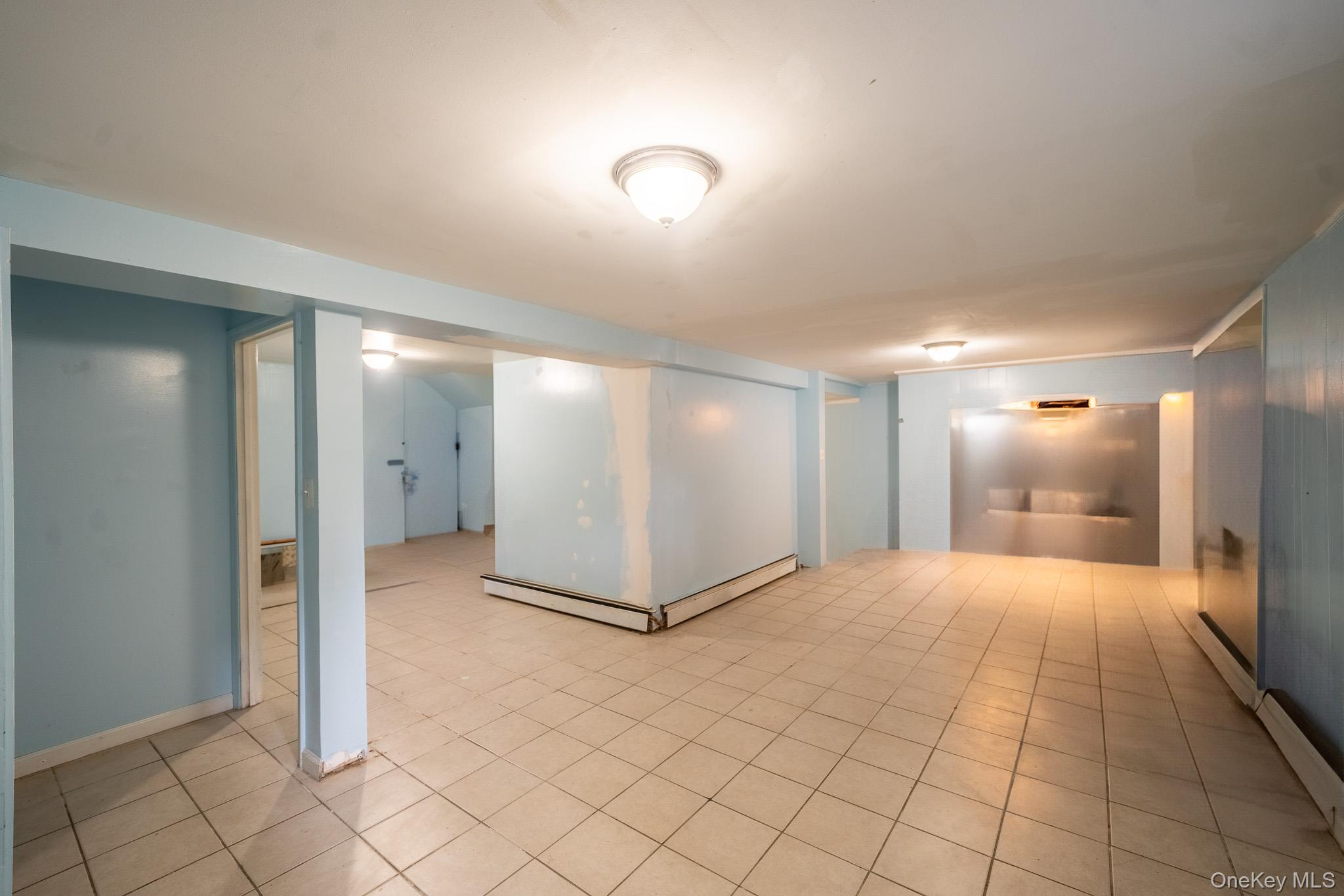 295 Washington Street Hempstead, NY 11550 - Photo 14 of 17 a view of a hallway