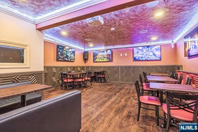 541 Union Avenue Paterson, NJ 07522 - Photo 14 of 28 a reading room with furniture and wooden floor