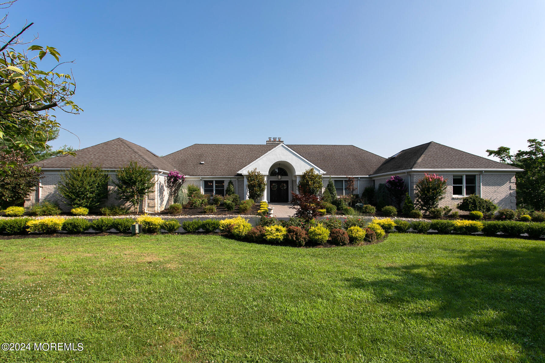 1 Eagle Nest Road Colts Neck, NJ 07722 - Photo 4 of 68 a front view of a house with garden