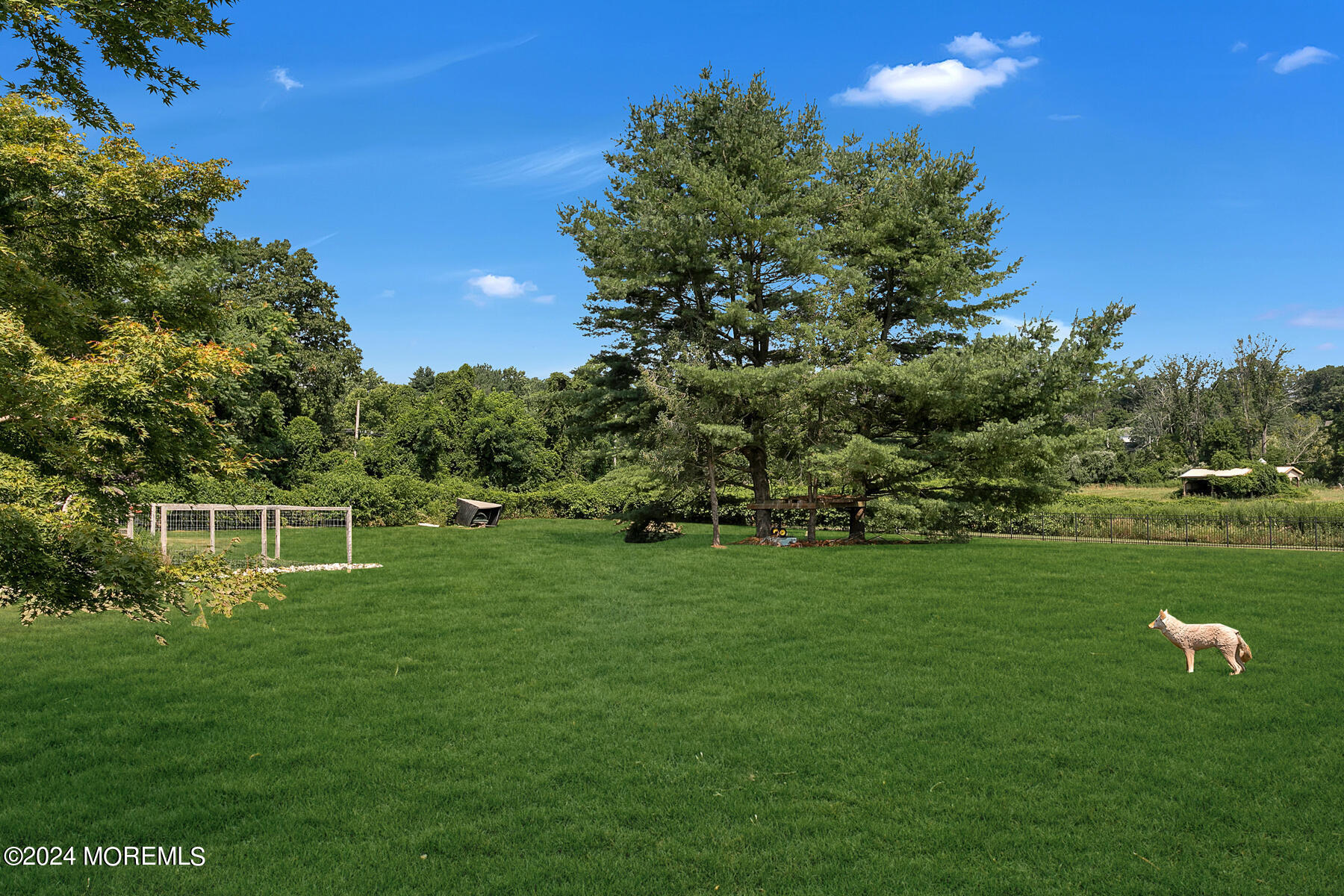 1 Eagle Nest Road Colts Neck, NJ 07722 - Photo 54 of 68 a view of a golf course with a lake