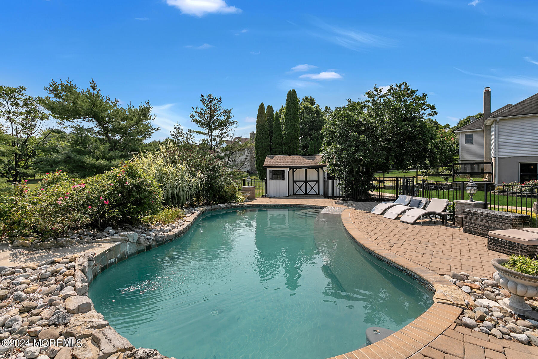 1 Eagle Nest Road Colts Neck, NJ 07722 - Photo 65 of 68 a view of a swimming pool with a patio