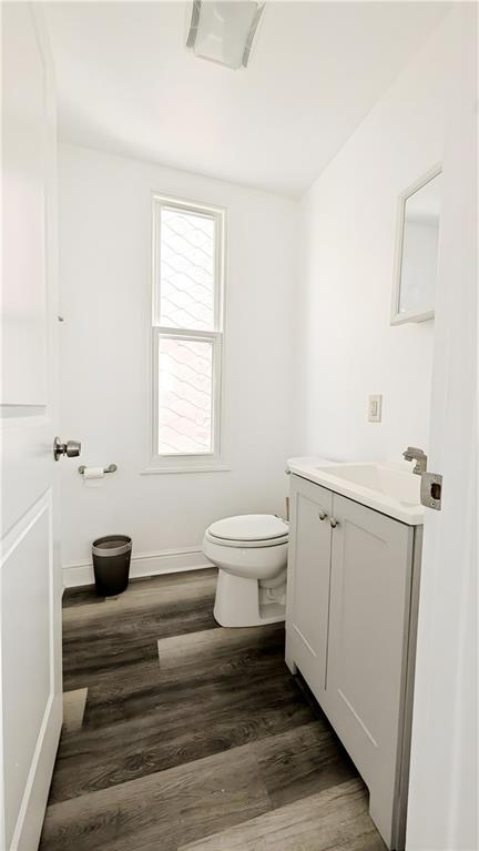 735 Boquet Street McKees Rocks, PA 15136 - Photo 22 of 30 a bathroom with a sink a toilet and a window