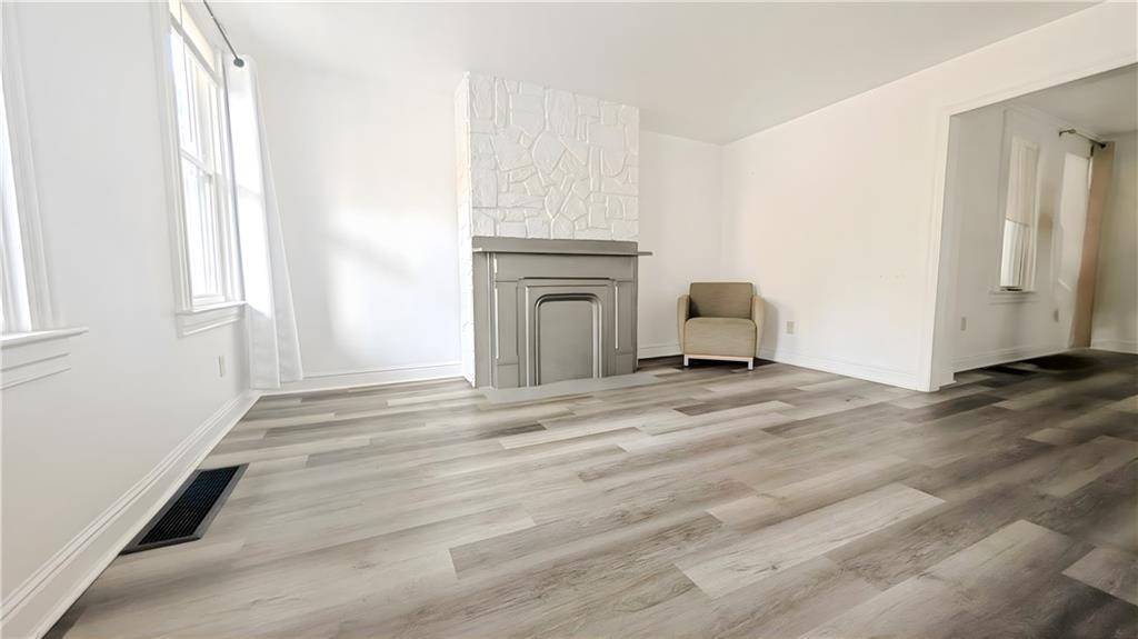 735 Boquet Street McKees Rocks, PA 15136 - Photo 5 of 30 a view of a livingroom with furniture and cabinet