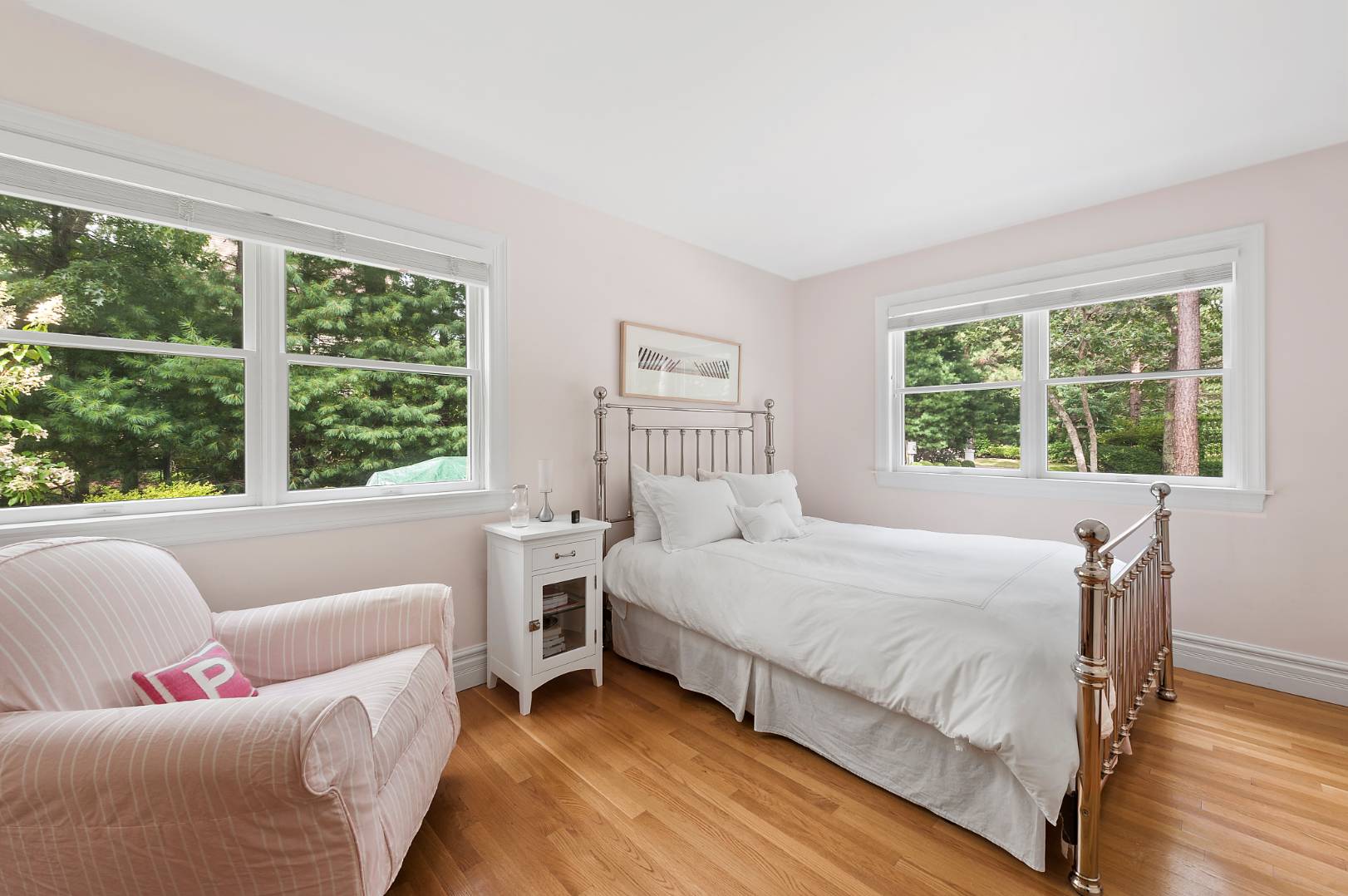 25 East Gate Road Wainscott, NY 11975 - Photo 8 of 13 a bedroom with a bed and a large window