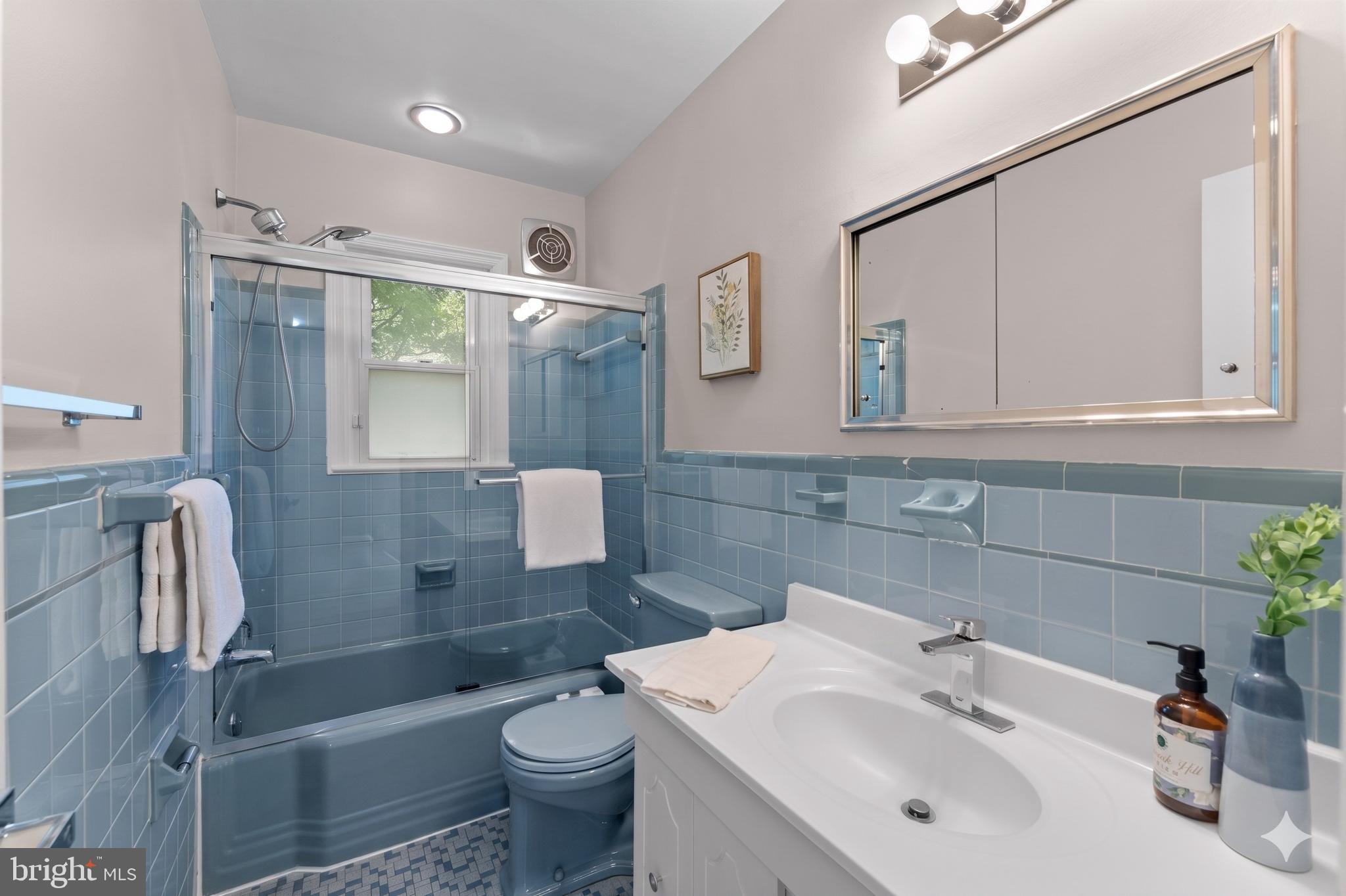 11712 Berwick Road Silver Spring, MD 20904 - Photo 20 of 42 a bathroom with a sink toilet and shower