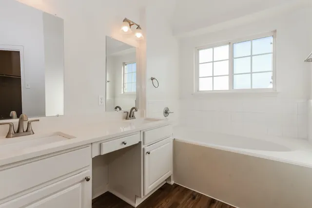 a bathroom with a sink and a bathtub
