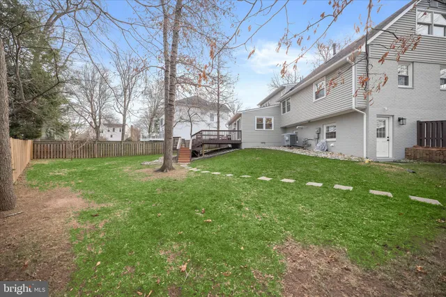 a house view with a sitting space and garden