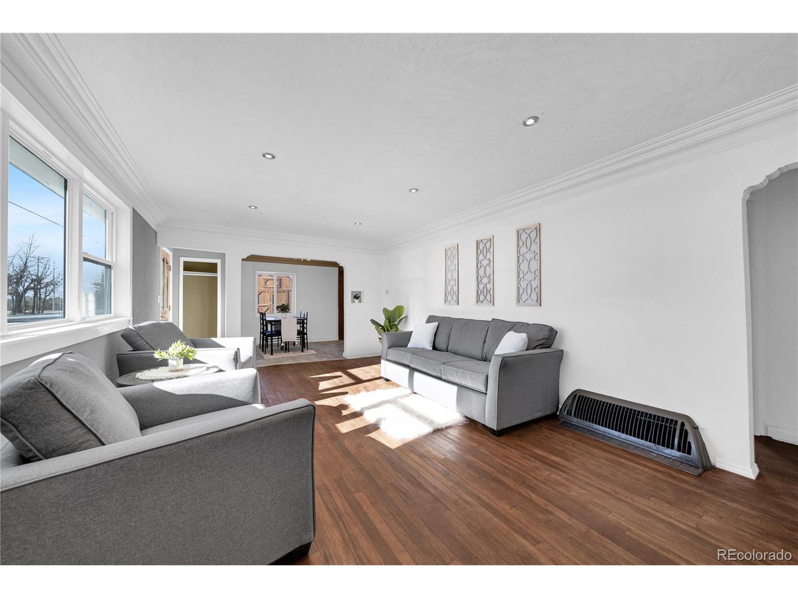 701 4th Street Akron, CO 80720 - Photo 10 of 26 a living room with furniture and wooden floor