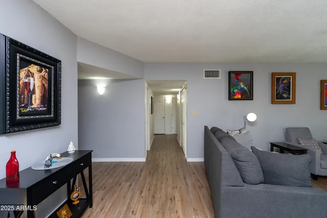 a living room with furniture and a window