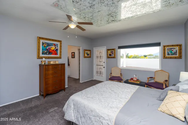 a view of a hallway with chairs