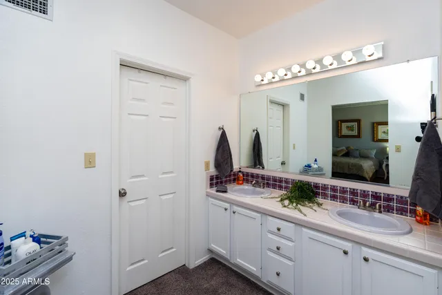 a view of swimming pool with a patio