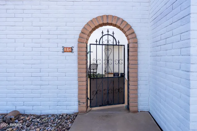 a view of an outdoor space and a car park in the back