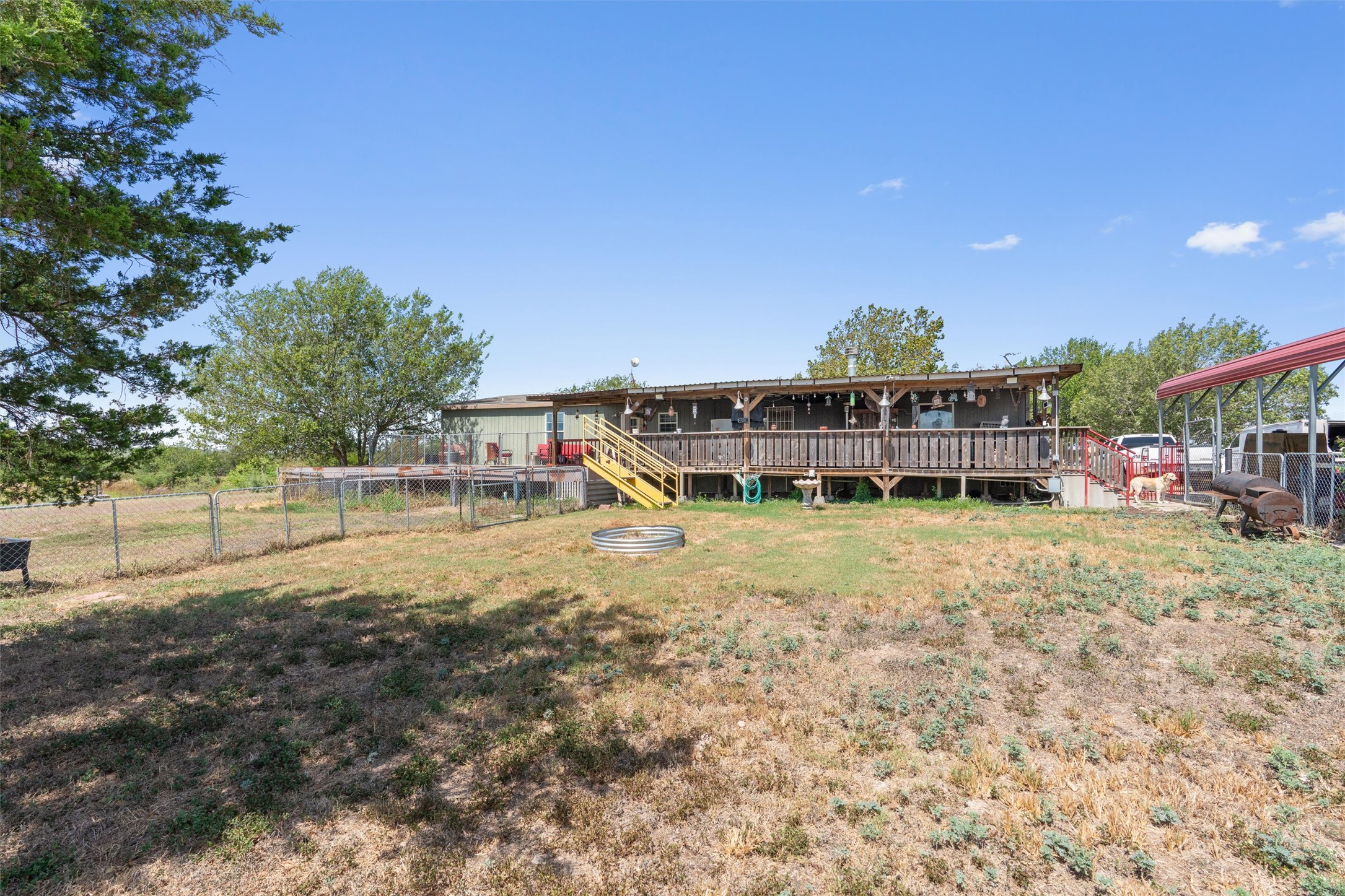 13111 Elm Grove Road Buda, TX 78610 - Photo 17 of 39 backyard of front home