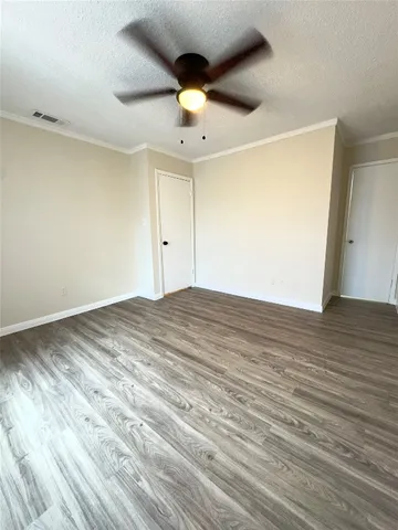 a view of a porch with wooden floor