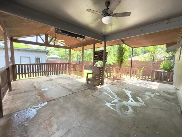a view of a porch with wooden floor and outdoor space