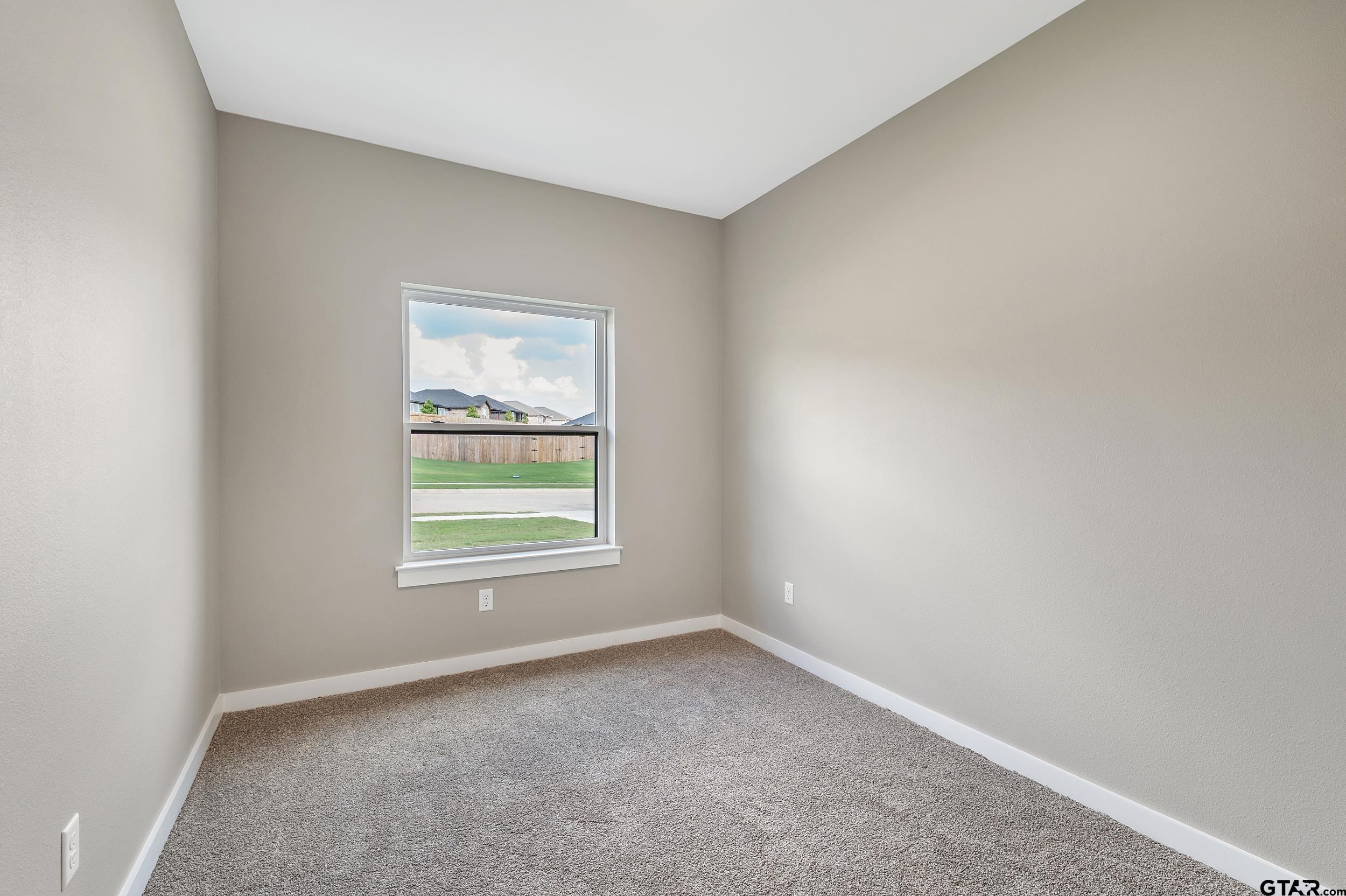 16418 Crossing Circle Lindale, TX 75771 - Photo 19 of 31 an empty room with a window
