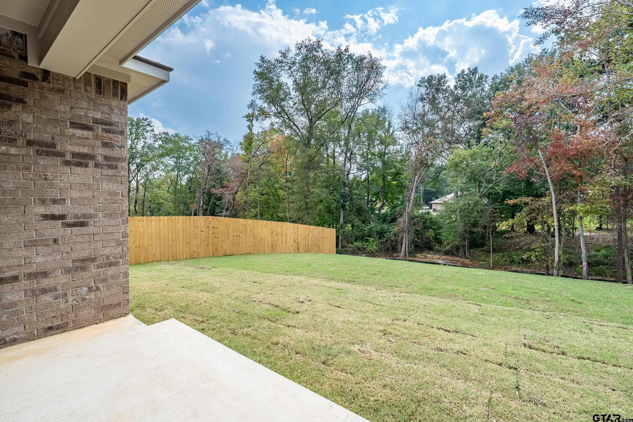 16418 Crossing Circle Lindale, TX 75771 - Photo 23 of 31 a view of a backyard