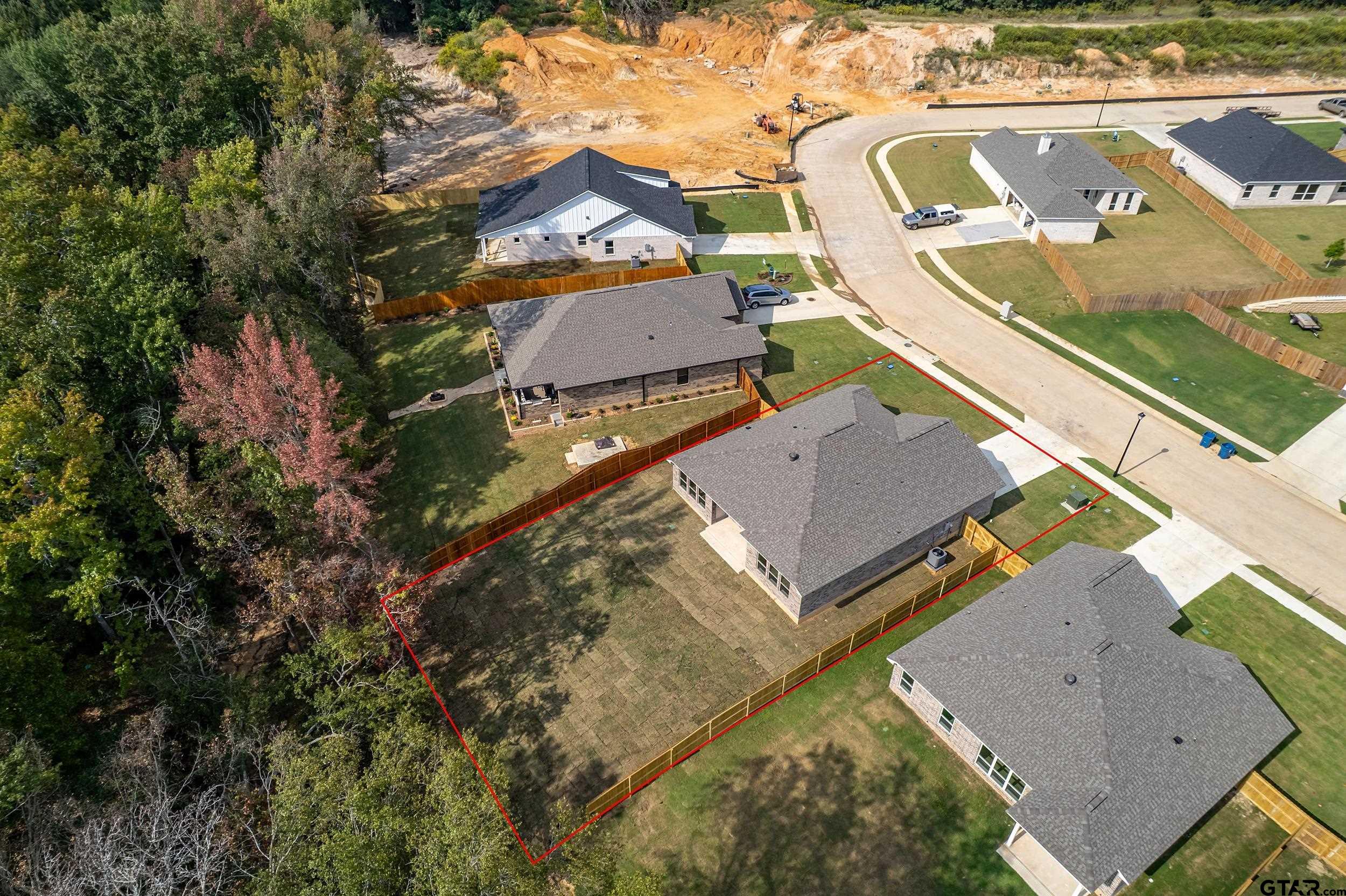 16418 Crossing Circle Lindale, TX 75771 - Photo 30 of 31 an aerial view of a house with a yard