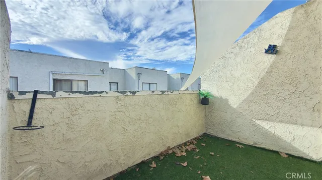 a view of a garage with a car parked