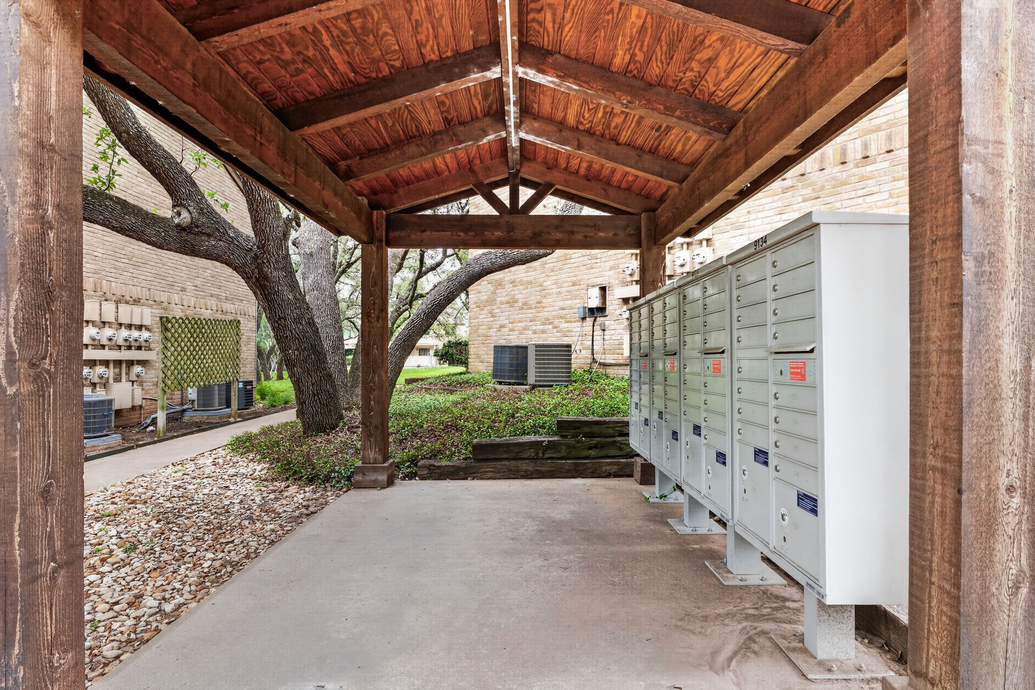 8210 Bent Tree Road, Unit 256 Austin, TX 78759 - Photo 22 of 29 a view of a porch with a tree