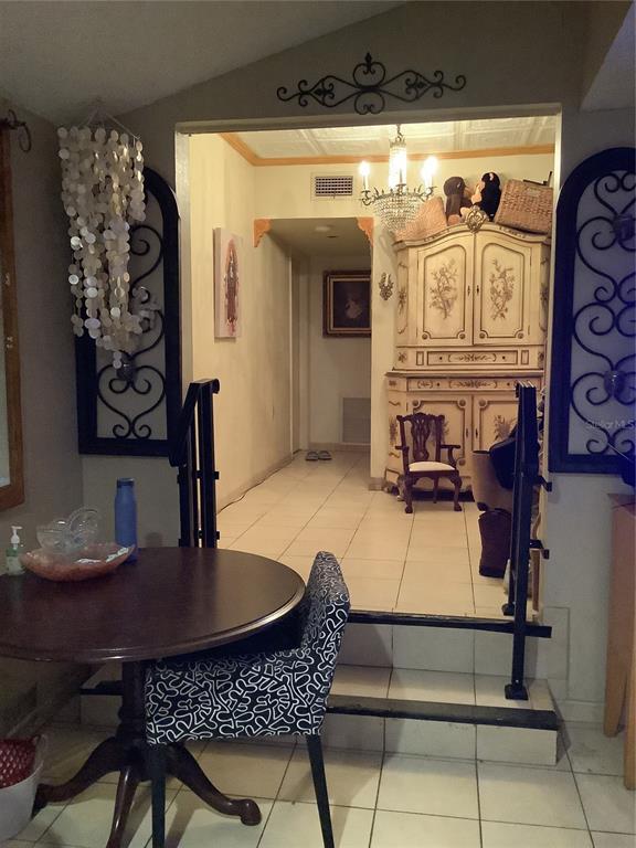 1906 Southwest 17th Court Miami, FL 33145 - Photo 11 of 33 a dinning table and chairs in a room