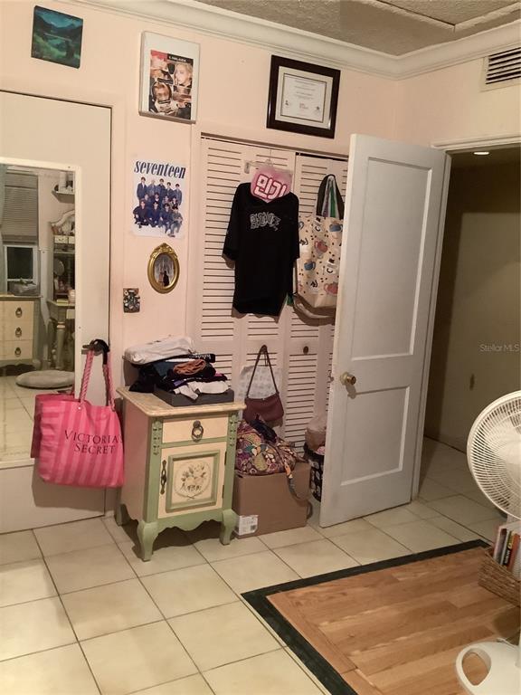 1906 Southwest 17th Court Miami, FL 33145 - Photo 18 of 33 a view of kitchen with stainless steel appliances granite countertop a stove and a refrigerator