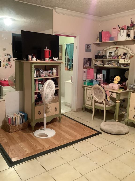 1906 Southwest 17th Court Miami, FL 33145 - Photo 19 of 33 a room with furniture and a flat screen tv