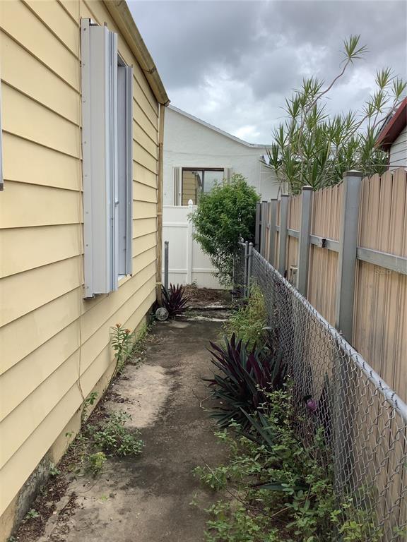 1906 Southwest 17th Court Miami, FL 33145 - Photo 31 of 33 a view of small garden with wooden fence