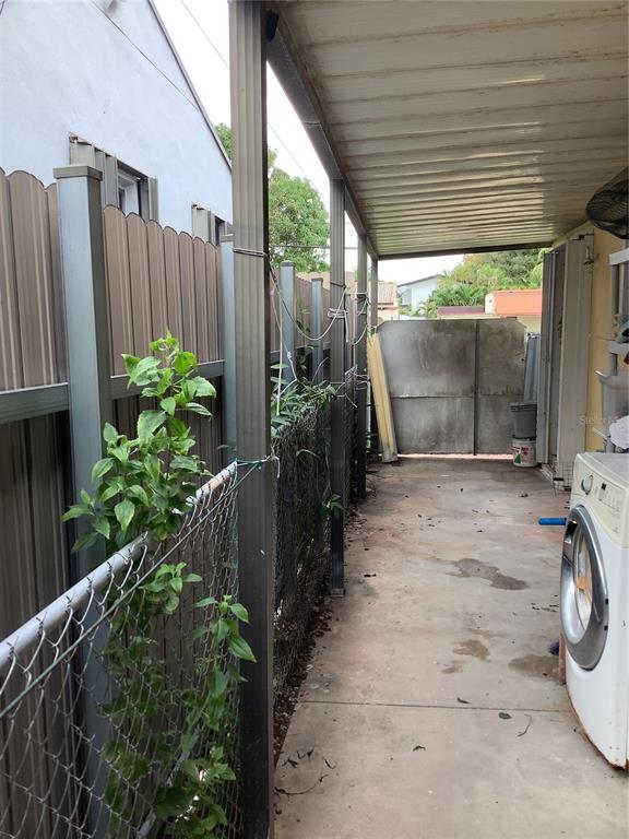 1906 Southwest 17th Court Miami, FL 33145 - Photo 33 of 33 a view of a backyard with pathway and a garden