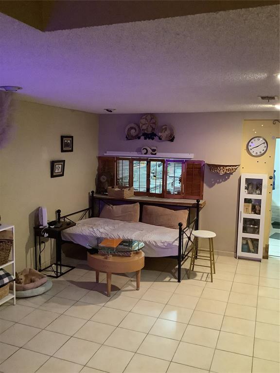 1906 Southwest 17th Court Miami, FL 33145 - Photo 10 of 33 a outdoor living space with furniture and a rug