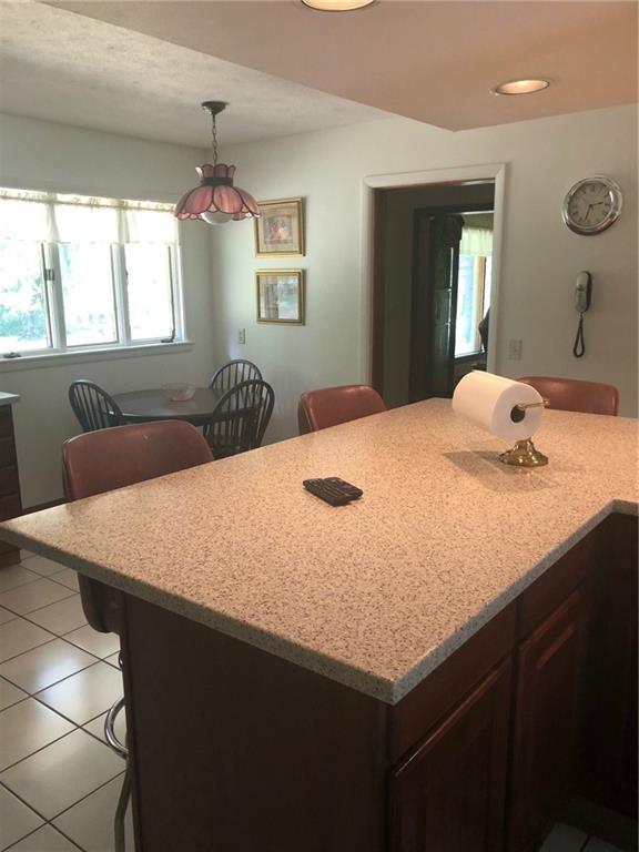 397 Hadley Road Greenville, PA 16125 - Photo 9 of 17 Kitchen Island with bar stools, eat in section in corner
