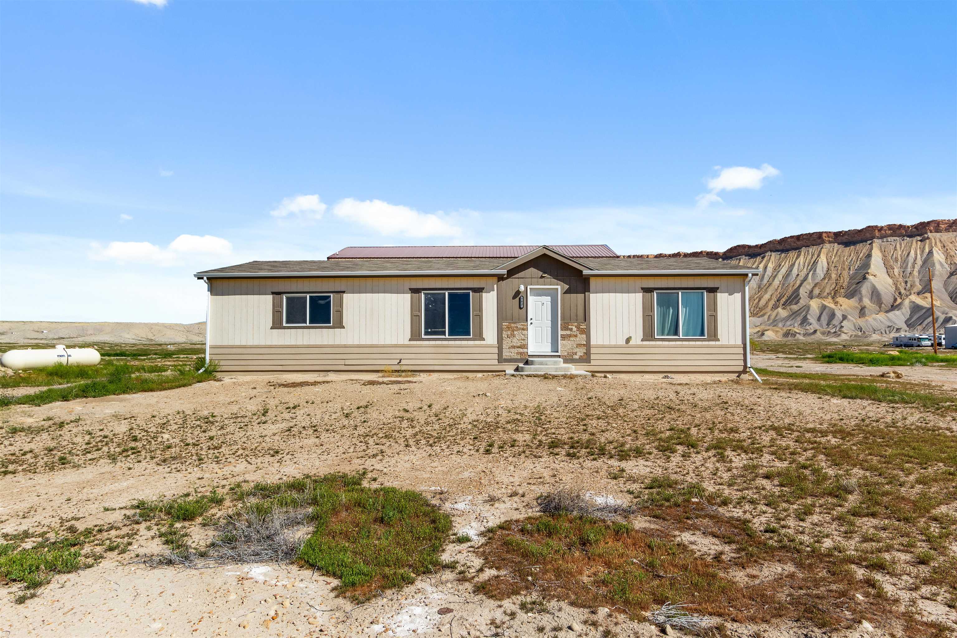 759 33 Road Clifton, CO 81520 - Photo 32 of 35 a house with a yard