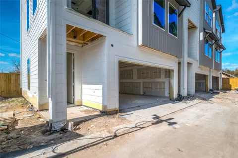 a bathroom with a sink a toilet and a shower