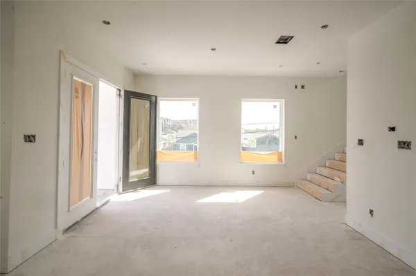 a front view of a house with a garage