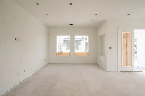 a view of storage and utility room with washer and dryer