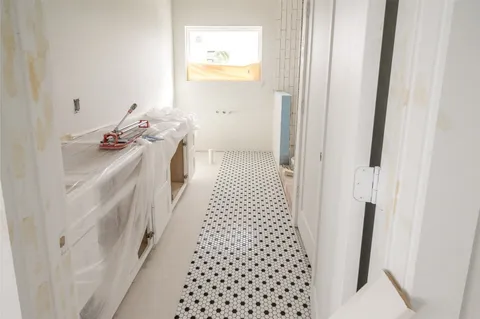 a front view of a house with a garage