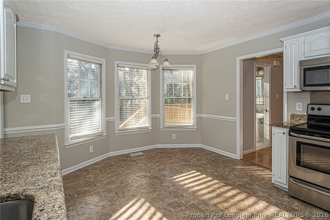 7787 Trappers Road Fayetteville, NC 28311 - Photo 16 of 47 a view of an empty room with a window