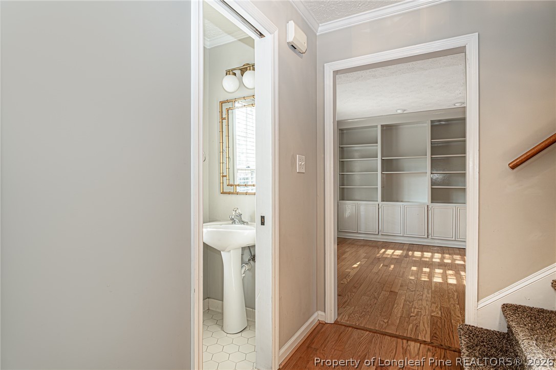 7787 Trappers Road Fayetteville, NC 28311 - Photo 18 of 47 a view of a bathroom with a glass door