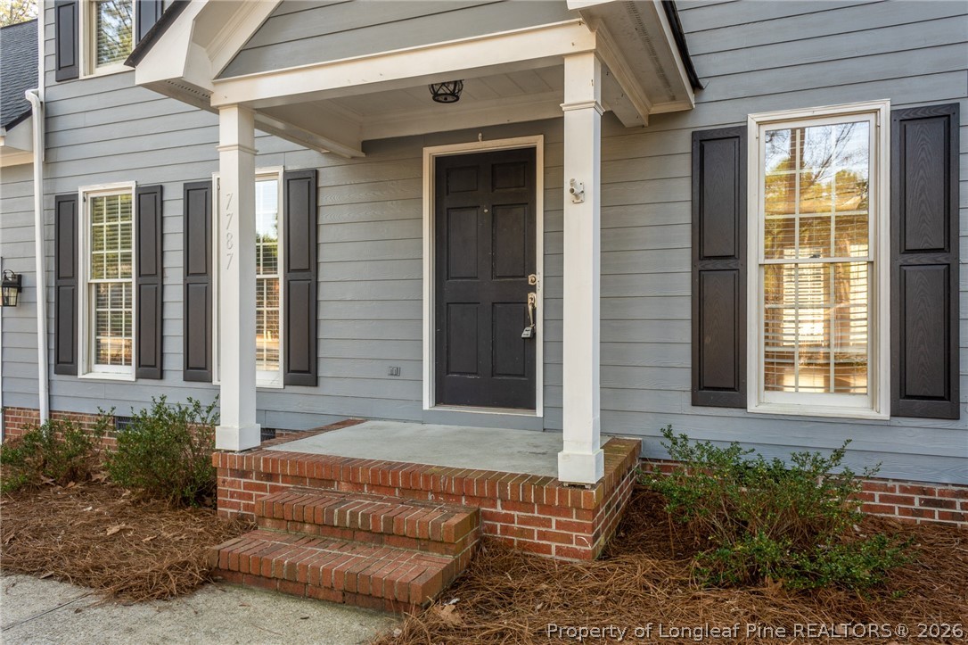 7787 Trappers Road Fayetteville, NC 28311 - Photo 2 of 47 a front view of a house with a yard