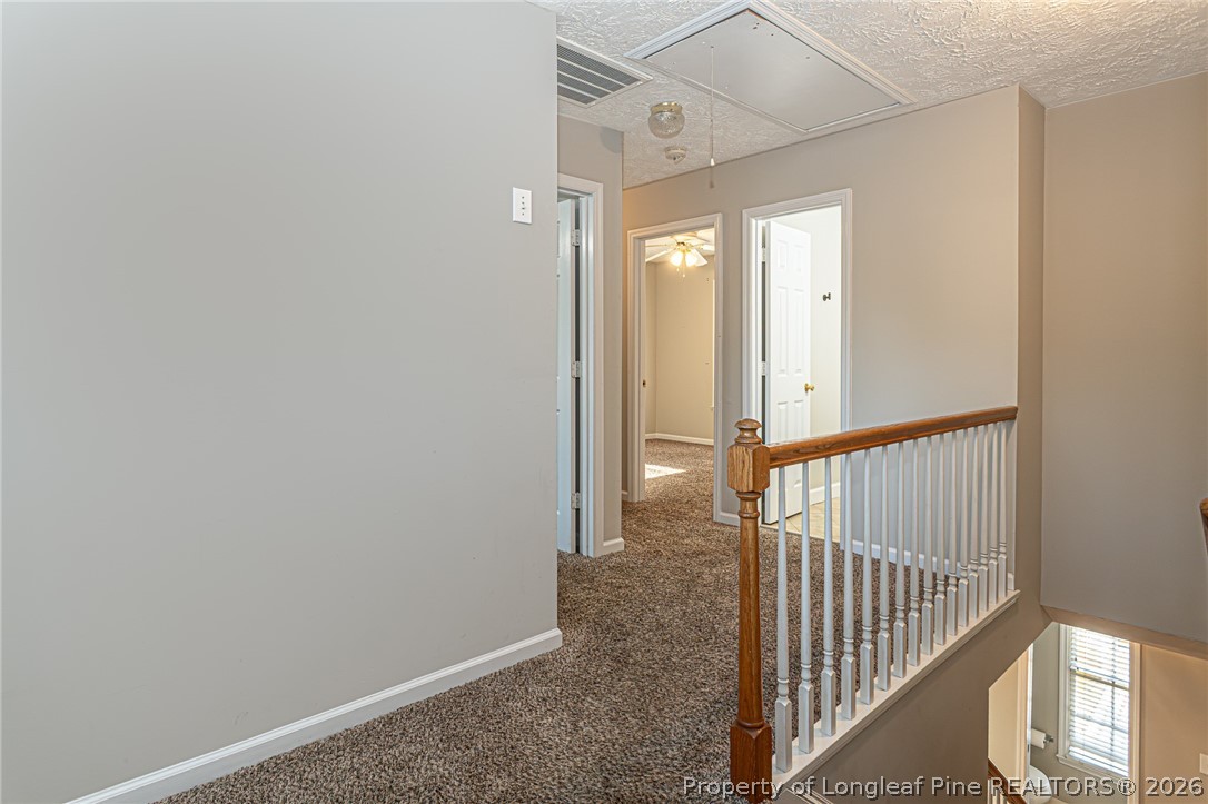 7787 Trappers Road Fayetteville, NC 28311 - Photo 27 of 47 a view of a hallway view with staircase