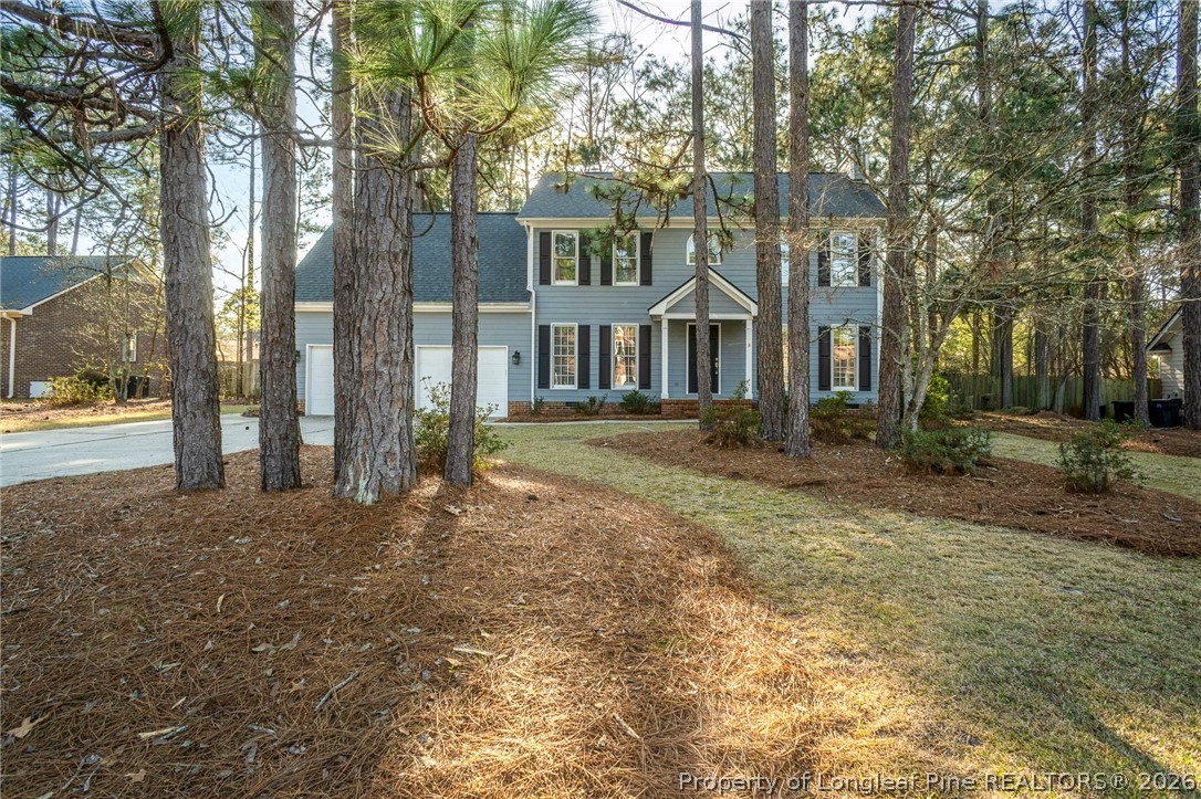 7787 Trappers Road Fayetteville, NC 28311 - Photo 37 of 47 a front view of a house with a yard