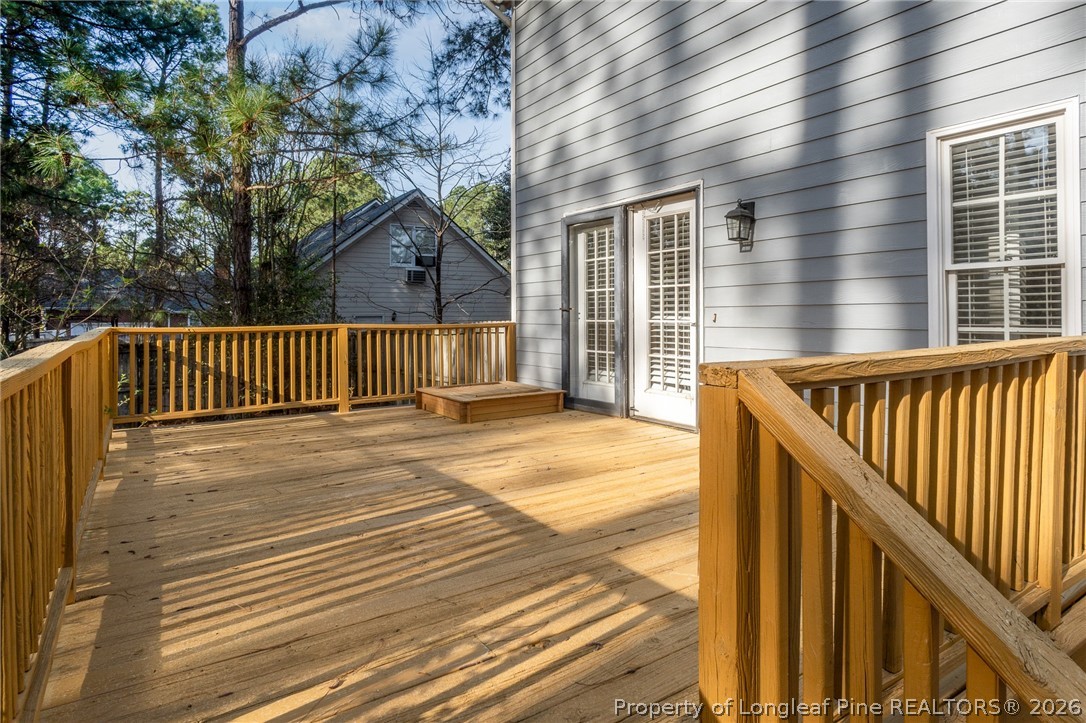 7787 Trappers Road Fayetteville, NC 28311 - Photo 43 of 47 a view of a wooden deck