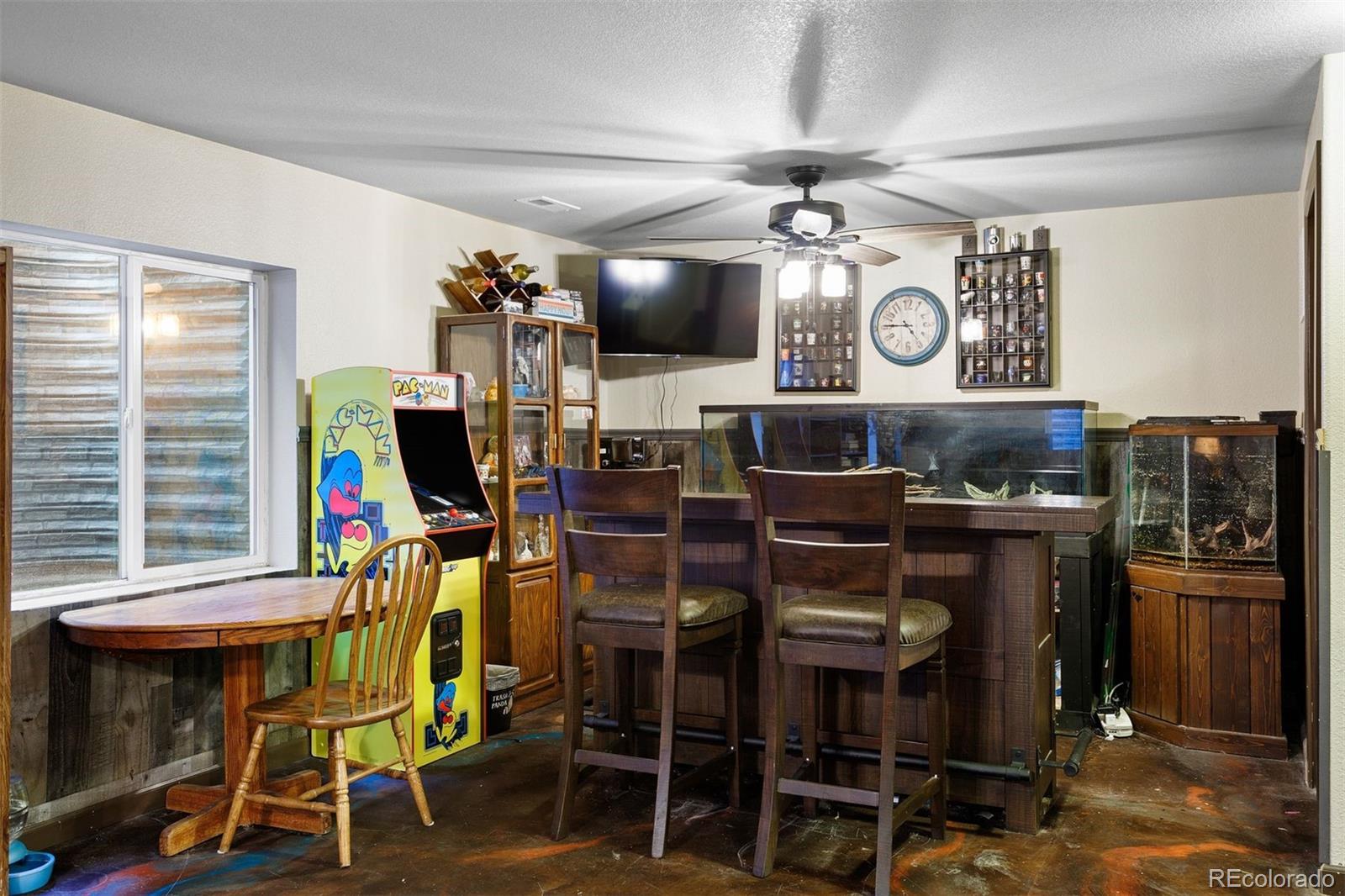 2556 Hannah Ridge Drive Colorado Springs, CO 80922 - Photo 12 of 39 a view of a room with furniture and windows