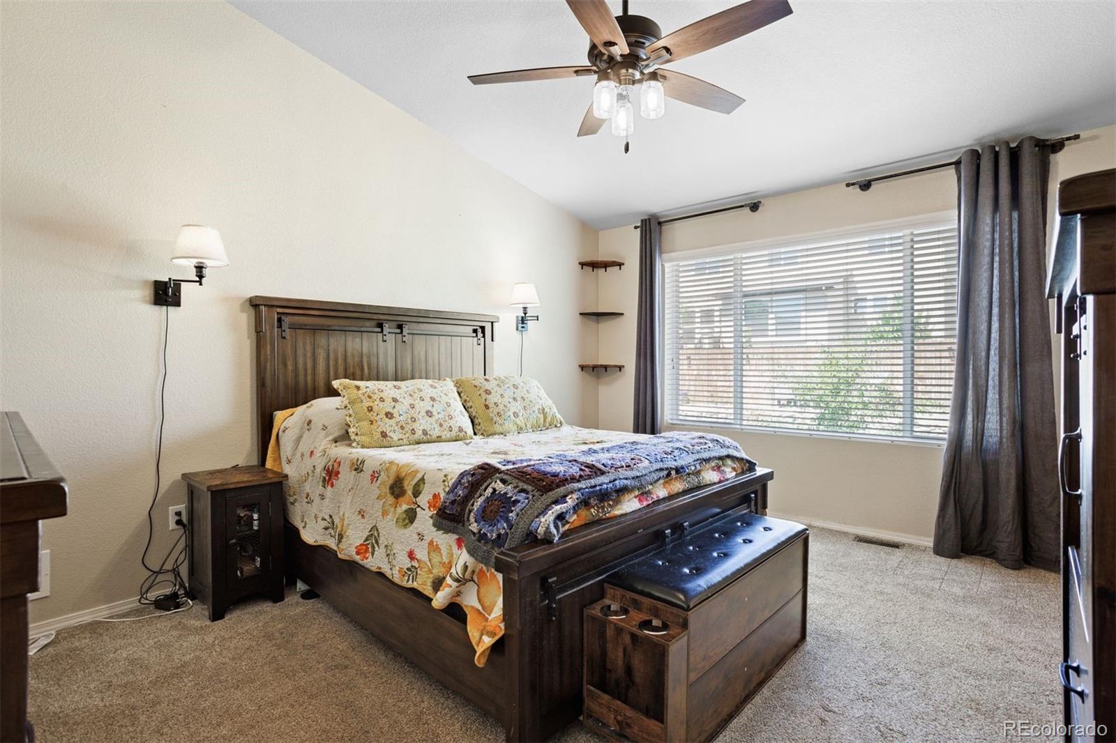 2556 Hannah Ridge Drive Colorado Springs, CO 80922 - Photo 15 of 39 a bed sitting in a bedroom next to a window