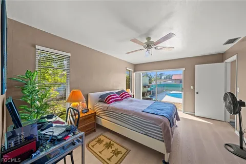 a bathroom with a double vanity sink toilet and shower