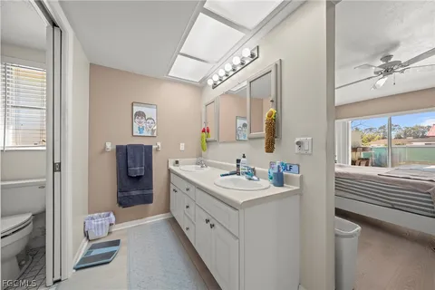 a bathroom with a shower and a toilet