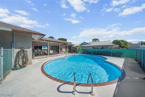 a view of a playground with basketball court