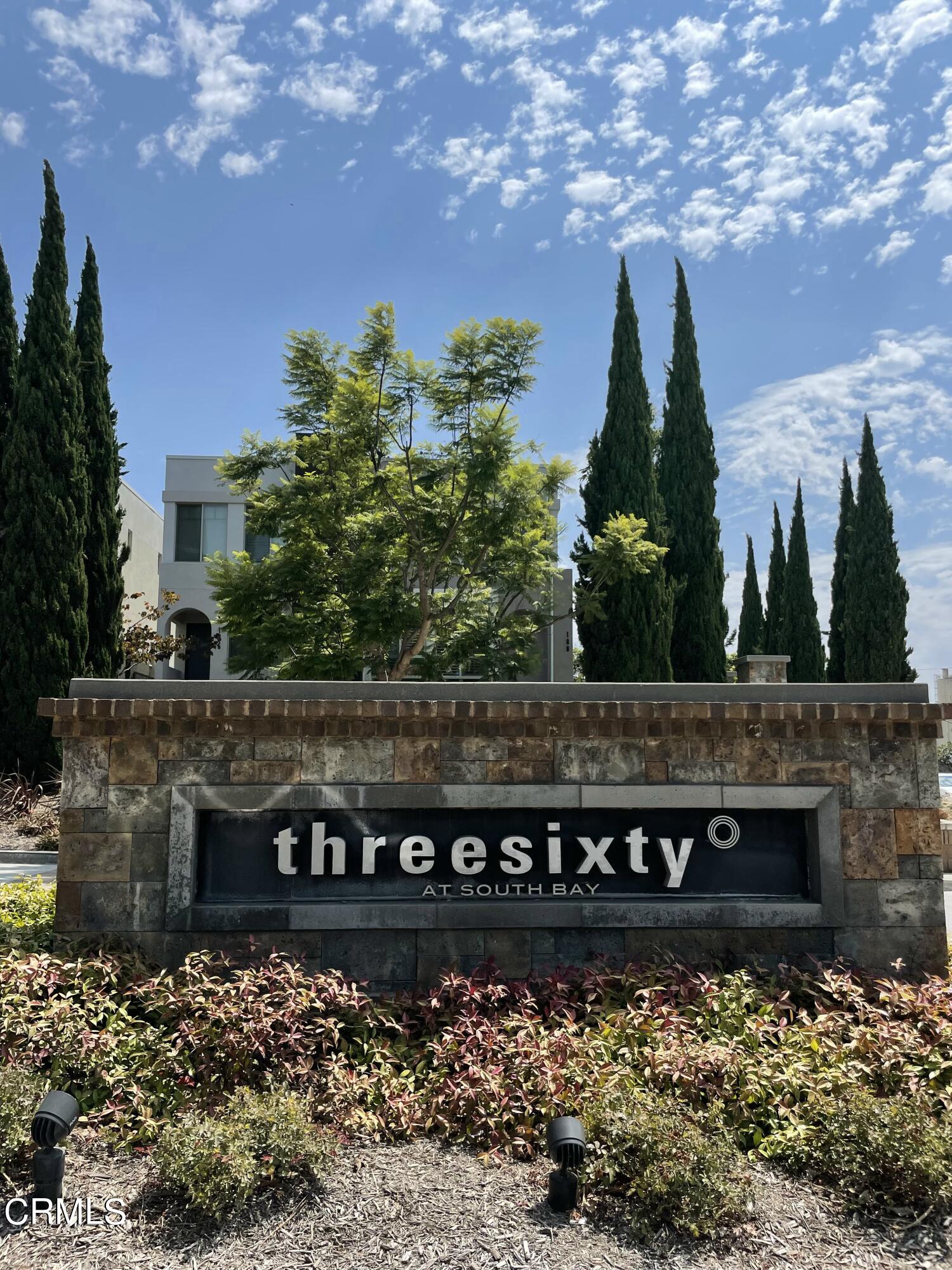 a view of a yard in front of a house with a yard